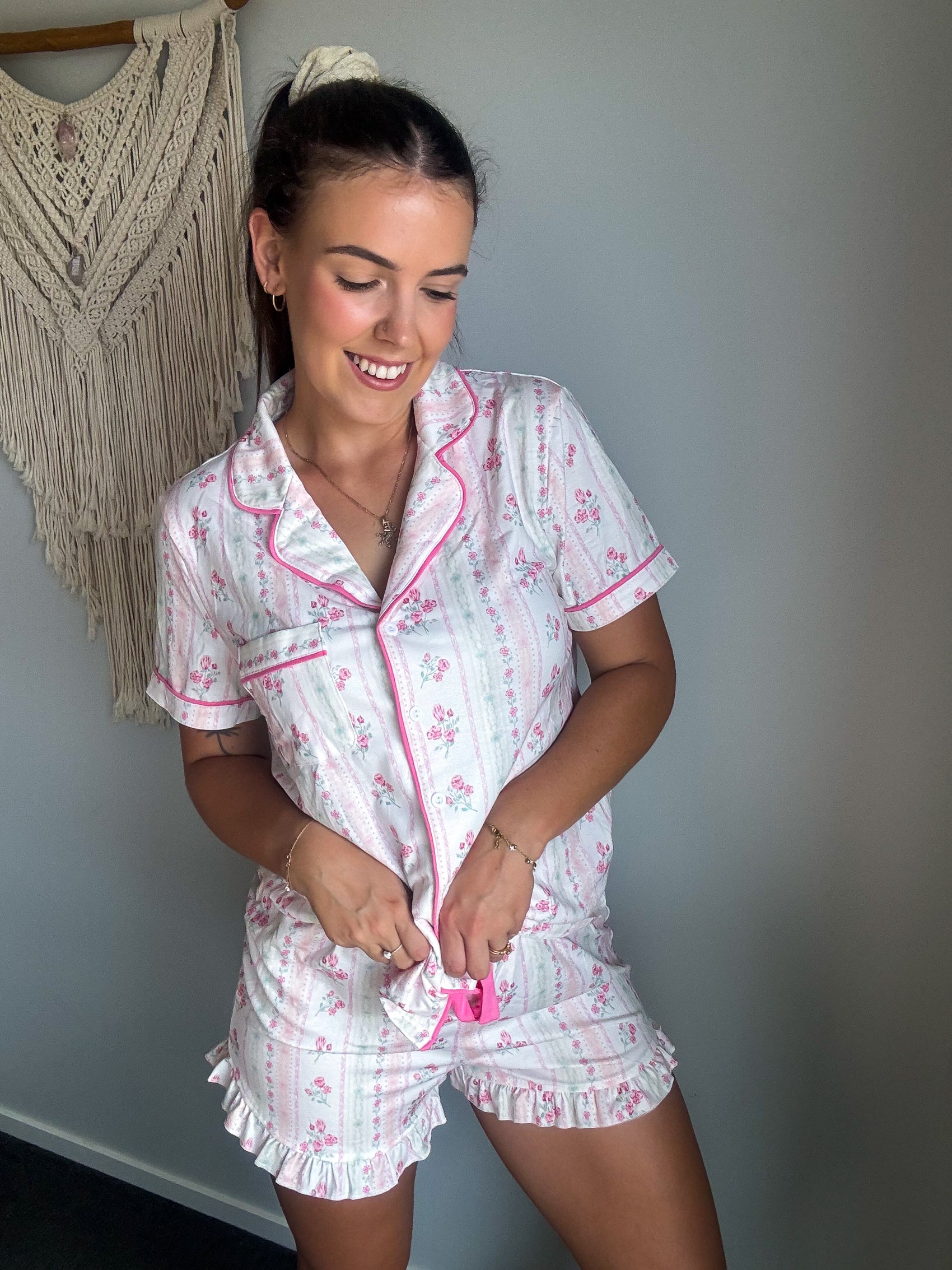 Girl wearing floral print pyjamas.